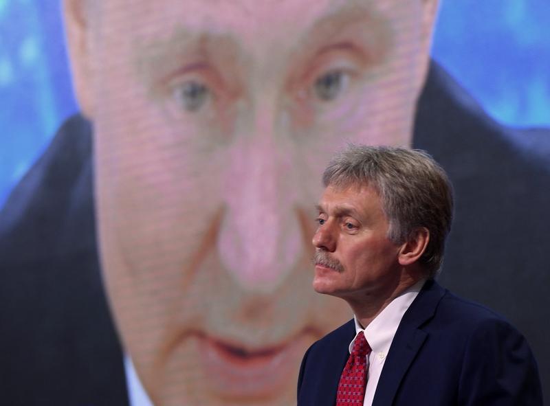 Dmitri Peskov si Vladimir Putin