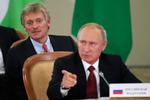 Dmitry Peskov și Vladimir Putin