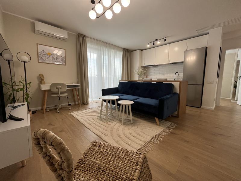Fotografie dintr-un apartament de două camere, închiriat cu 900 de euro (cu loc de parcare subteran), în zona Timpuri Noi din București