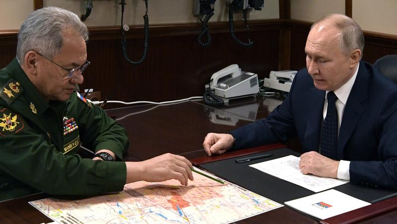 Serghei Șoigu și Vladimir Putin
