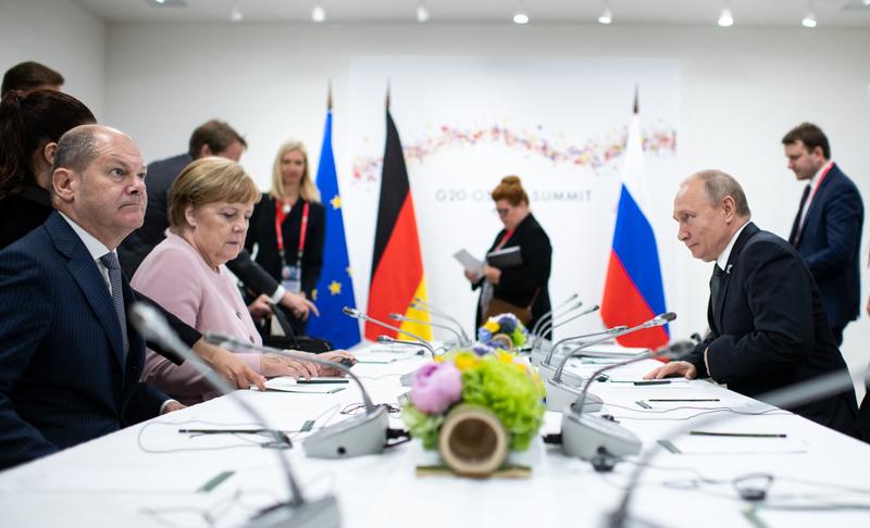 Olaf Scholz la o intalnire cu Putin din 2019, cand actualul cancelar german era ministrul finantelor in guvernul Angelei Merkel