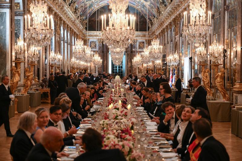 Oaspeții participă la un banchet la Palatul Versailles, pe 20 septembrie 2023, în prima zi a unei vizite regale britanice de stat în Franța.